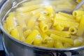 Cooking pasta at home. Italian pasta cooked in salted water. Royalty Free Stock Photo