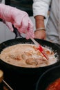 Cooking pasta with seafood in a cooking class. Italian pasta with seafood. Mussels, squid, shrimp Royalty Free Stock Photo