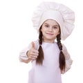 Cooking and people concept - smiling little girl in cook hat Royalty Free Stock Photo