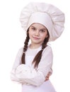 Cooking and people concept - smiling little girl in cook hat Royalty Free Stock Photo