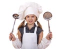 Cooking and people concept - smiling little girl in cook hat Royalty Free Stock Photo