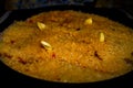 Cooking pilaf with rice, spices and garlic