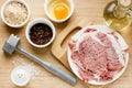 Cooking pork chops process, ingredient on wooden table Royalty Free Stock Photo