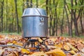 Cooking on a portable gas burner in outdoor conditions hikes Royalty Free Stock Photo