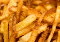 Cooking potato fries in oil Royalty Free Stock Photo