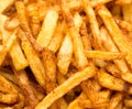 Cooking potato fries in oil Royalty Free Stock Photo