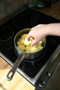 cooking potatoes, boiling