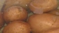 Cooking potatoes in `uniform` - potatoes that have been subjected to heat treatment for their preparation entirely, without peelin