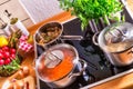 Cooking pots on the stove Royalty Free Stock Photo