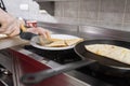 Cooking process of quesadilla with pans cook is cutting in pieces