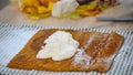 Cooking Pumpkin roll with the cream.