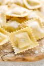 Cooking ravioli on a floured kitchen table