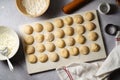 Cooking ravioli with ricotta and cottage cheese filling to dough.