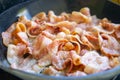Cooking Raw bacon Royalty Free Stock Photo