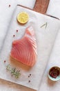 Cooking of raw piece of tuna albacore fish