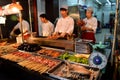 Four chefs preparing food in a restaurant, Xi'an, China 