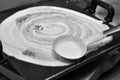 Cooking round south indian dishdosa with white batter and ladle on hot non stick pan with hot vapour Royalty Free Stock Photo