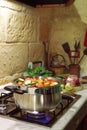 Cooking in rustic kitchen