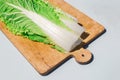 Cooking salad chinese cabbage on the old wooden board Royalty Free Stock Photo