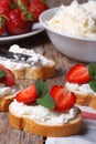 Cooking sandwiches with soft cheese and fresh strawberries Royalty Free Stock Photo