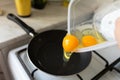 Cooking scrambled eggs for a healthy breakfast Royalty Free Stock Photo