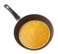 Cooking scrambled eggs omelette in a pan Royalty Free Stock Photo