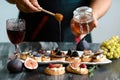 Cooking set of sandwiches, bruschetta with fresh figs, walnuts and honey with space area. Food banner