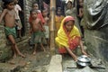 Cooking in shabby alley slum Mirpur, Bangladesh