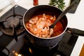 Cooking shrimp in the pan on the gas stove Royalty Free Stock Photo