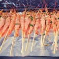 Cooking shrimp on skewers in the oven Royalty Free Stock Photo