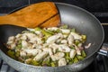 Cooking sliced onions, green peppers and chicken breasts Royalty Free Stock Photo