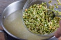 Cooking soup. Green peas in a bowl in a soup