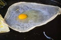 cooking Southern flat bread /egg on pan