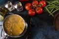 Cooking spaghetti in the pot with boiling water on dark background. Backstage of preparing restaurant or hotel meal. The