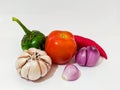 cooking spices such as tomatoes, chilies, garlic, onions and eggplants