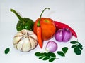 cooking spices such as tomatoes, chilies, garlic, onions and eggplants