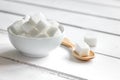 cooking sweets set with different sugar lumps on white table background close up