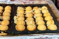 Cooking Takoyaki on hot pan Famous food Osaka Japan. Street food