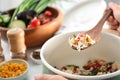 Cooking of tasty rice with vegetables in saucepan Royalty Free Stock Photo