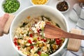 Cooking of tasty rice with vegetables in saucepan Royalty Free Stock Photo