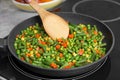 Cooking tasty vegetable mix in frying pan, closeup Royalty Free Stock Photo