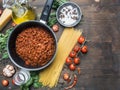 Cooking tomato paste with minced meat, cherry tomatoes, parsley, onion and garlic, butter, tomato paste cheese, the ingredient