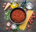 Cooking tomato paste with minced meat, cherry tomatoes, parsley, onion and garlic, butter, tomato paste and cheese, the ingredient