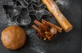 Cooking traditional biscuits and gingerbread. Christmas. New year. Dough, cutting the cookies and the spices on the table Royalty Free Stock Photo