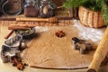 Cooking traditional biscuits and gingerbread. Christmas. New year. Dough, cutting the cookies and the spices on the table Royalty Free Stock Photo