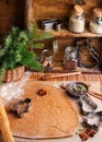 Cooking traditional biscuits and gingerbread. Christmas. New year. Dough, cutting the cookies and the spices on the table Royalty Free Stock Photo