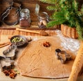 Cooking traditional biscuits and gingerbread. Christmas. New year. Dough, cutting the cookies and the spices on the table Royalty Free Stock Photo