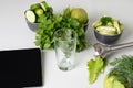 Cooking vegan drink and cocktail ingredients. Fruit  vegetable smoothie and ingredients  on  white table. Royalty Free Stock Photo