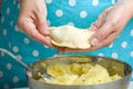 Cooking vegetarian dumplings with mashed potatoes kreplach, jewish ravioli in home kitchen. Female hands sculpts dumplings, Royalty Free Stock Photo