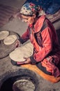 Cooking woman in Tajikistan